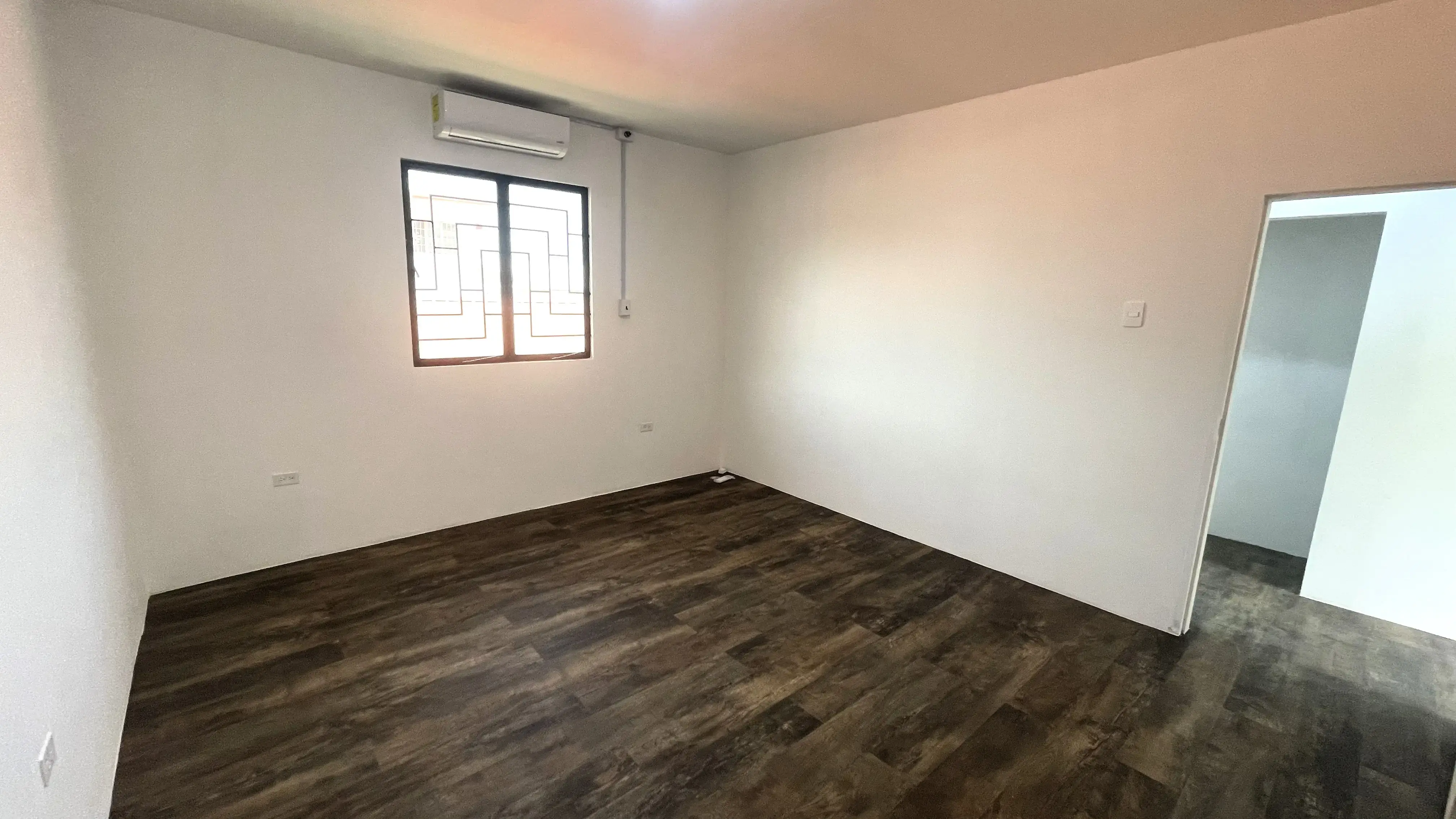 spacious-bedroom-carenage-apartment