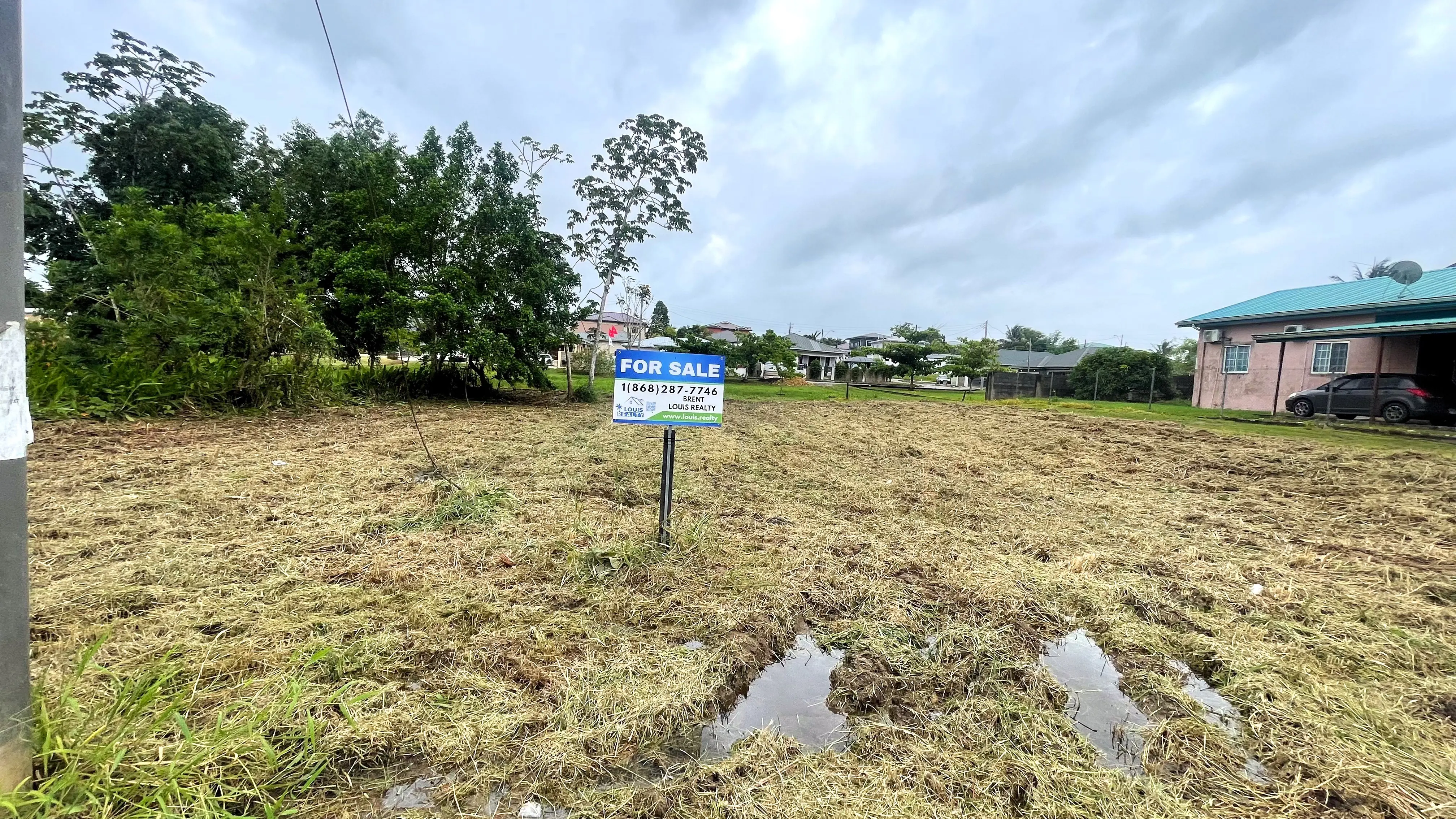 Frontage view of the 5,905 sq. ft. residential land along Boy Cato Road, Madras Settlement, Cunupia.